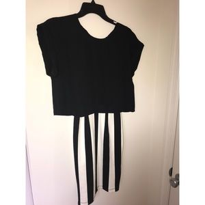 Black top, and striped bottom dress, is connected!